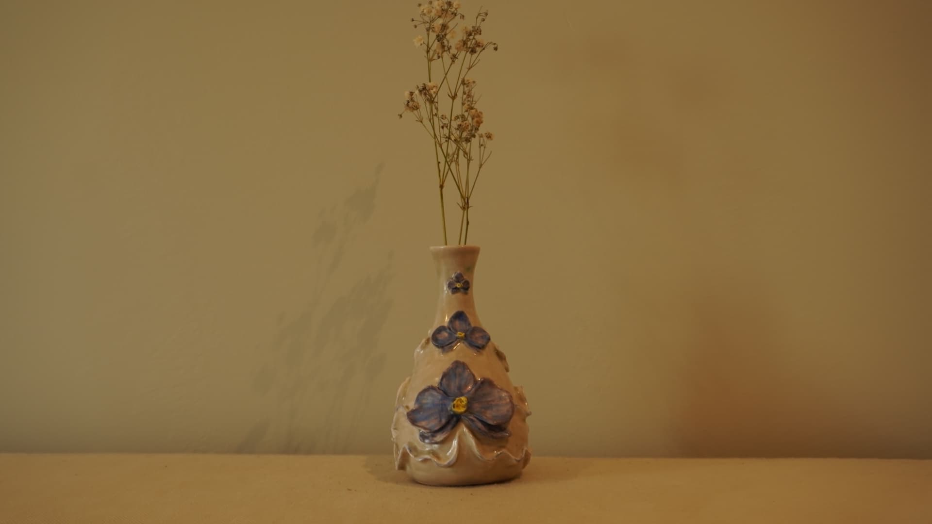 Rippled Orchid Vase · dropped on the floor · Obscure underglaze (blue) + Mayco FN202 Yadro — Ceramic work by RuiXuan Xu — Club