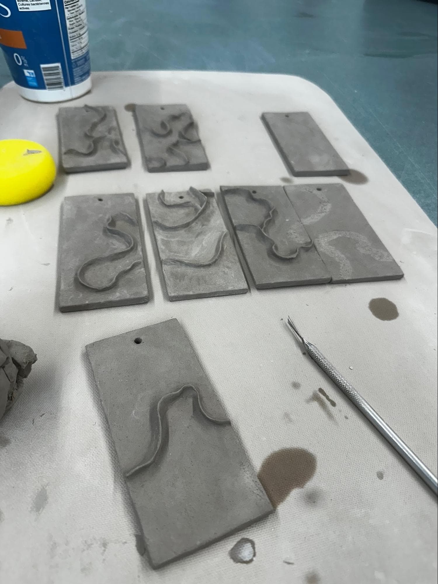 Non-functional Kitchen Tiles · wave design · used an array of blue/gray Mayco glazes — Ceramic work by RuiXuan Xu — School