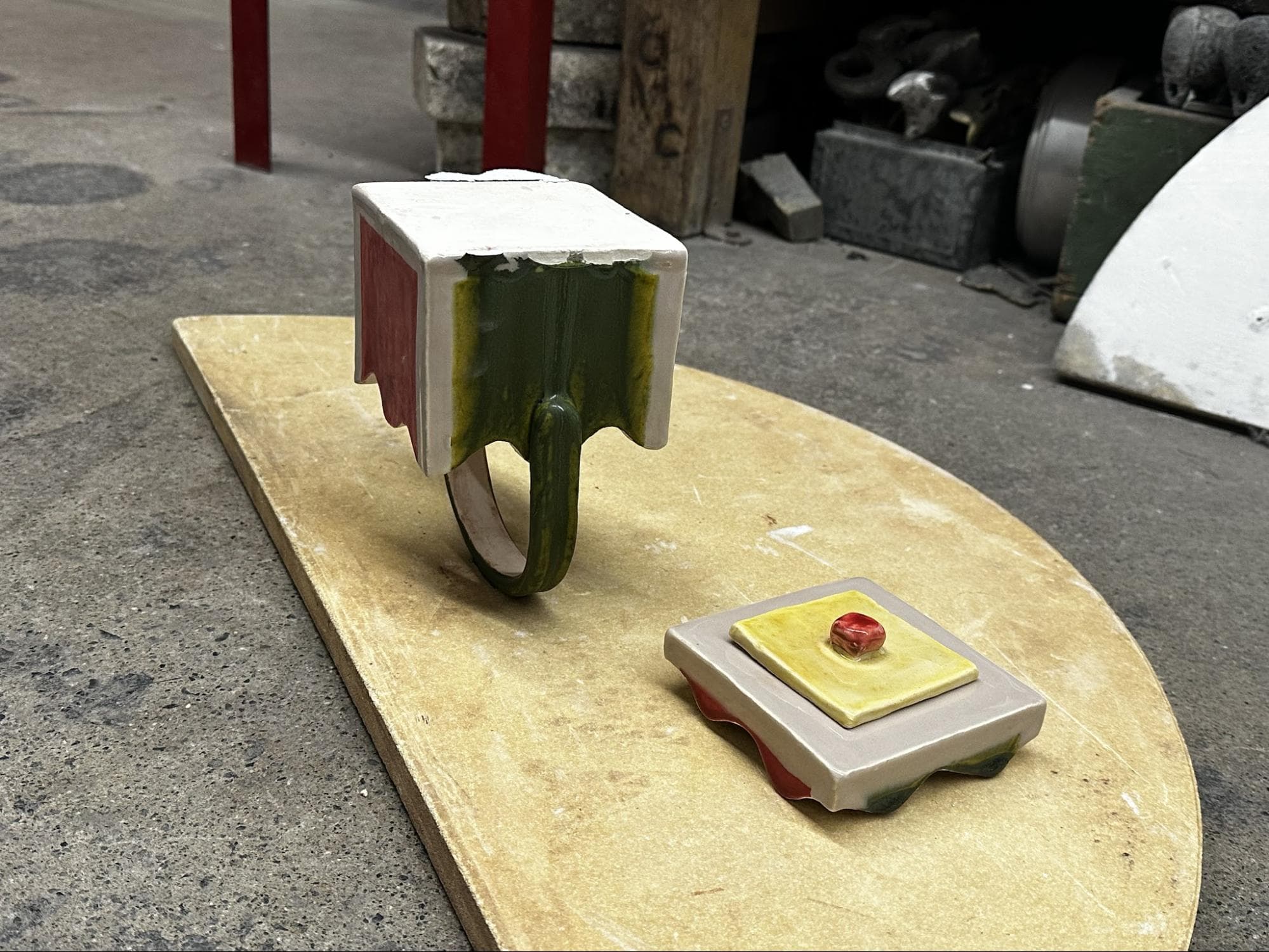 Teapot · unknown Duncan glaze ran and stuck to kiln shelf — Ceramic work by RuiXuan Xu — School